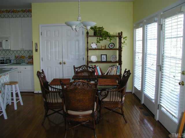 700 Neuse Ridge Drive Clayton, NC 27527 - Photo 5 of 10 a view of a dining room with furniture window and outside view