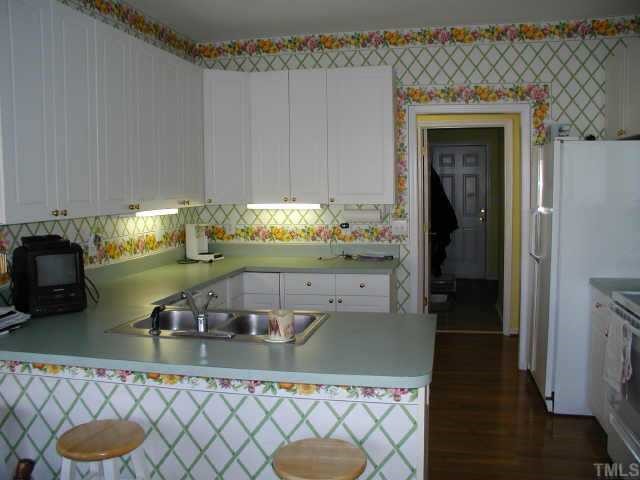 700 Neuse Ridge Drive Clayton, NC 27527 - Photo 6 of 10 a room with furniture and wooden floor