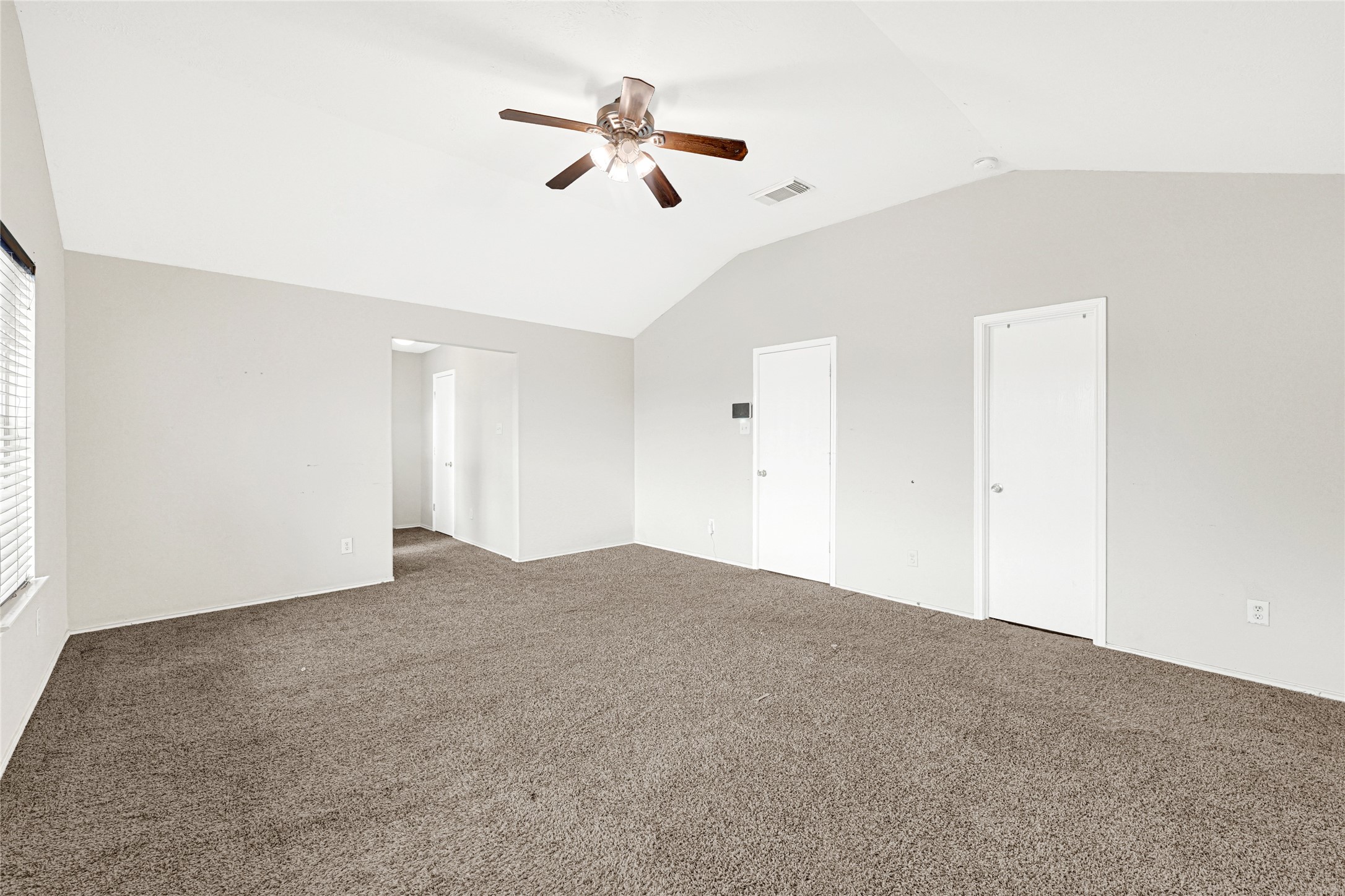 3431 Princeton Point Court Houston, TX 77047 - Photo 13 of 23 a view of empty room with ceiling fan