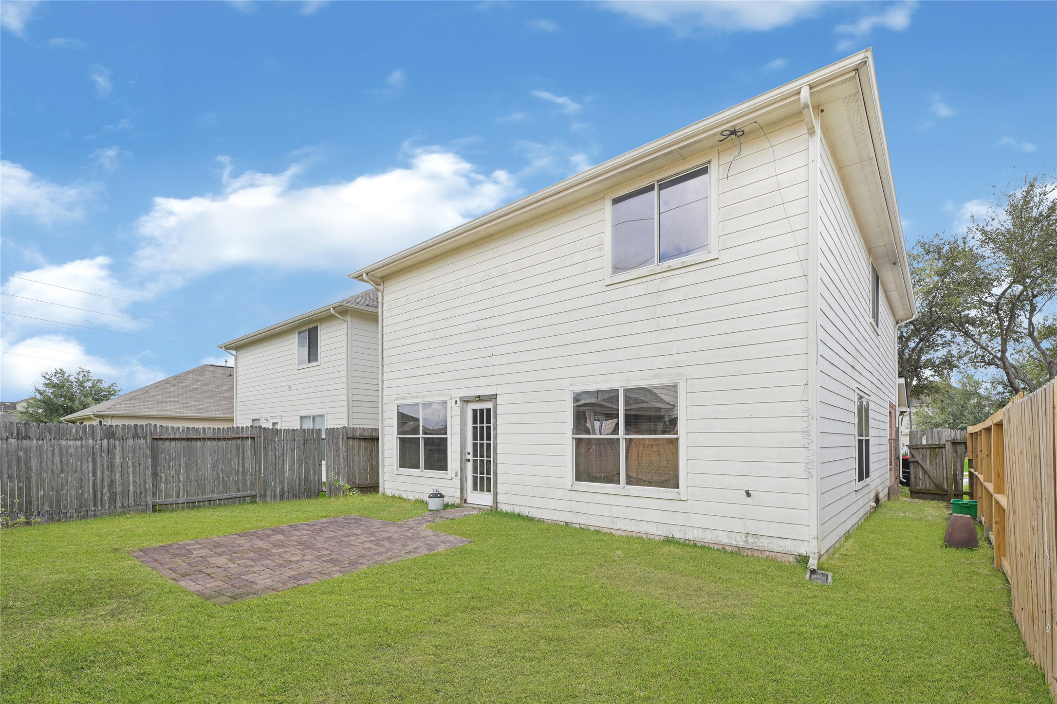 3431 Princeton Point Court Houston, TX 77047 - Photo 22 of 23 a view of a backyard of the house