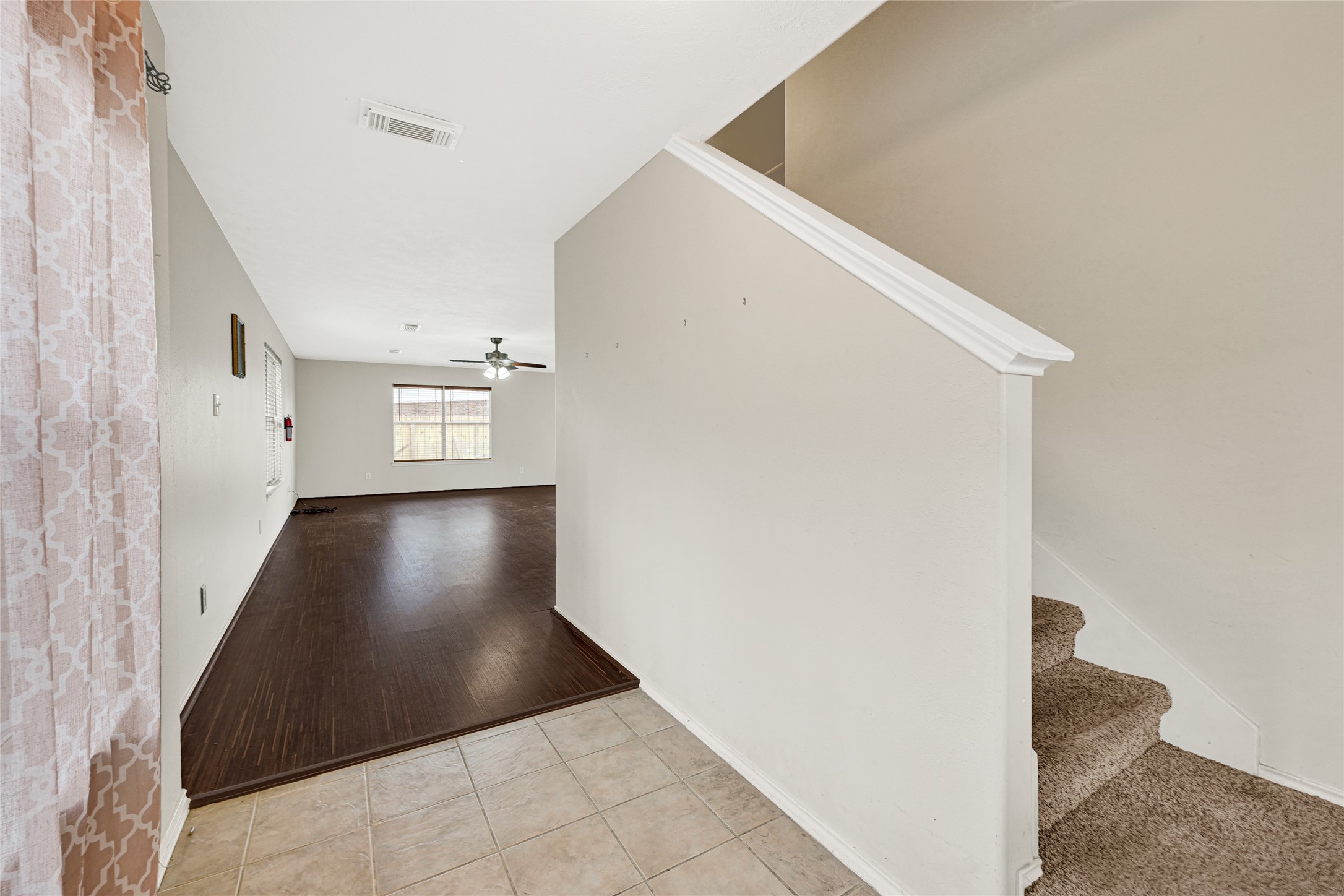 3431 Princeton Point Court Houston, TX 77047 - Photo 3 of 23 a view of a hallway view with staircase