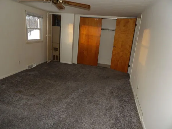 an empty room with windows