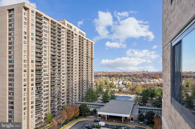 a view of a city with tall buildings