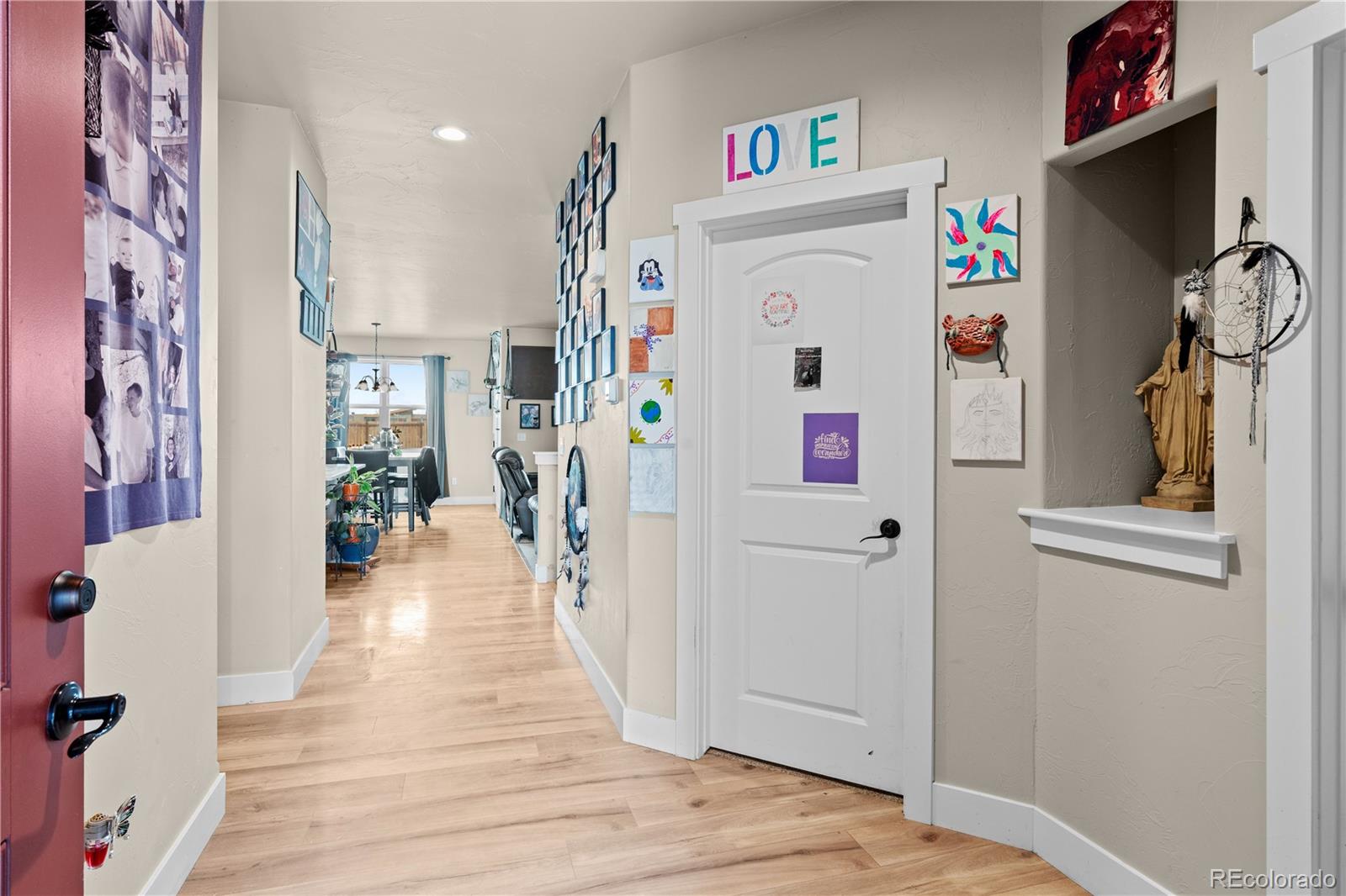 109 7th Avenue Wiggins, CO 80654 - Photo 16 of 38 a very nice looking room with a big white walls
