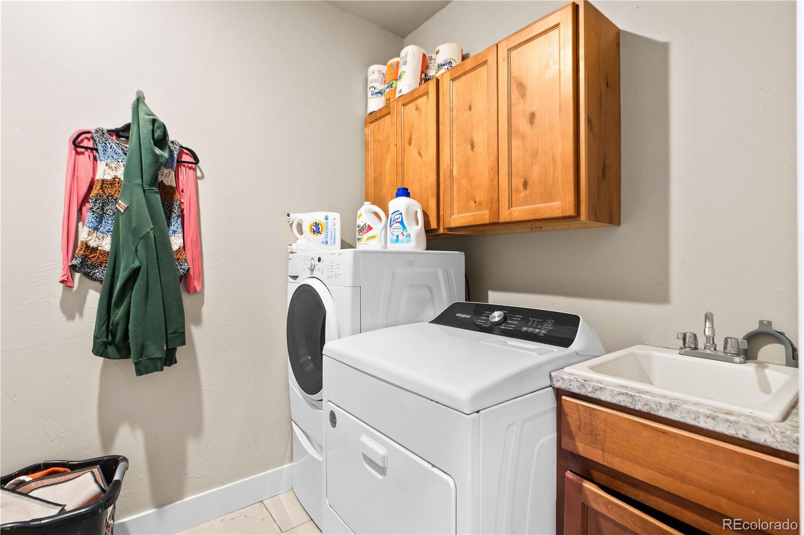 109 7th Avenue Wiggins, CO 80654 - Photo 24 of 38 a utility room with dryer and washer