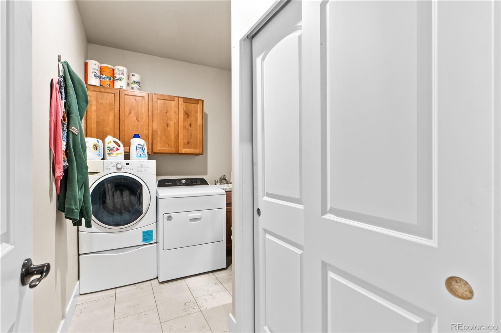 109 7th Avenue Wiggins, CO 80654 - Photo 25 of 38 a utility room with dryer and washer