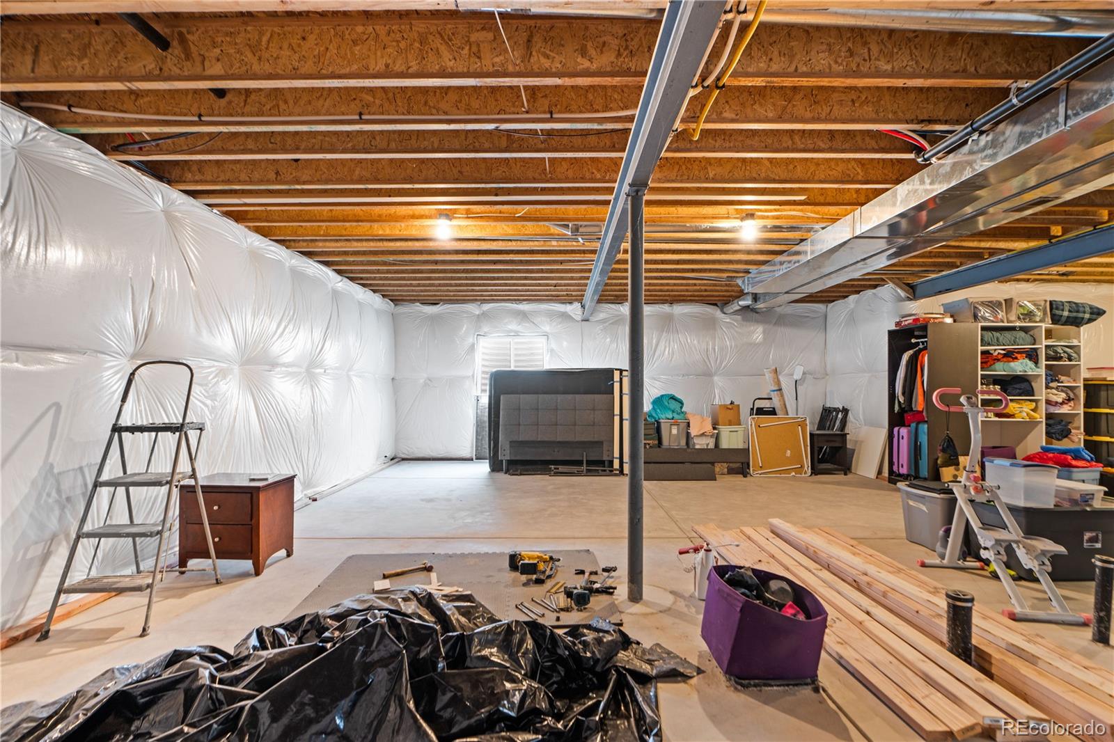 109 7th Avenue Wiggins, CO 80654 - Photo 30 of 38 a view of a room with gym equipment