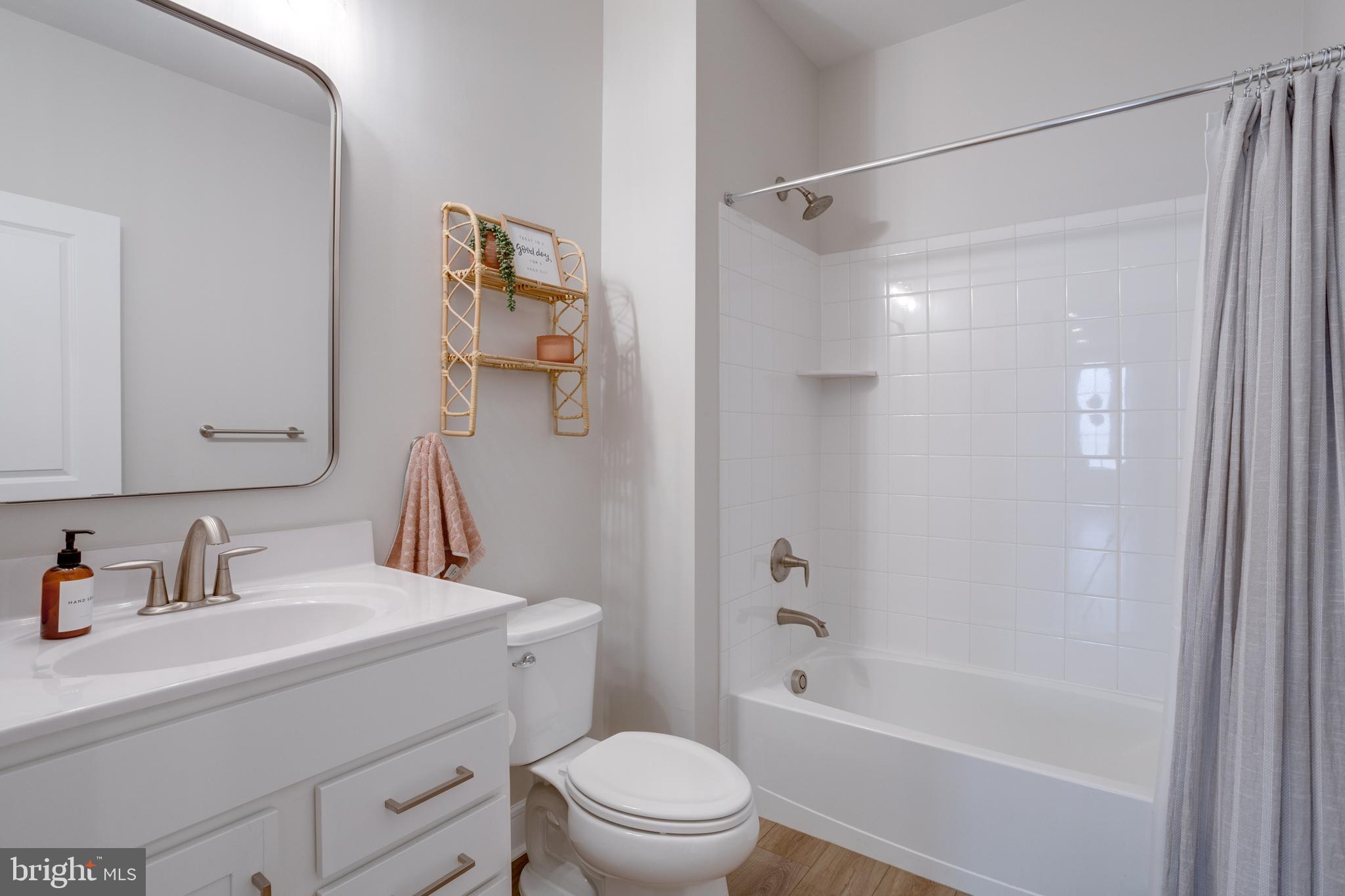 14488 Nebbiolo Drive Gainesville, VA 20155 - Photo 16 of 54 a bathroom with a sink toilet and shower