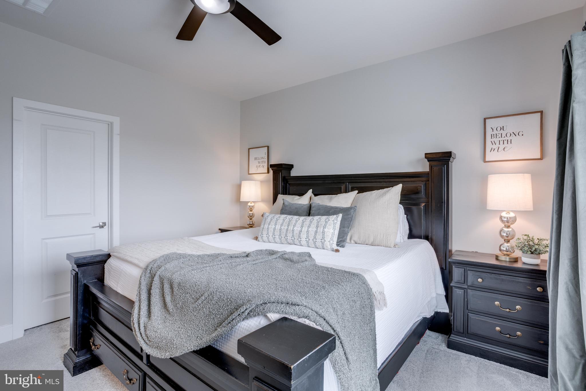 14488 Nebbiolo Drive Gainesville, VA 20155 - Photo 34 of 54 a bedroom with a bed and closet