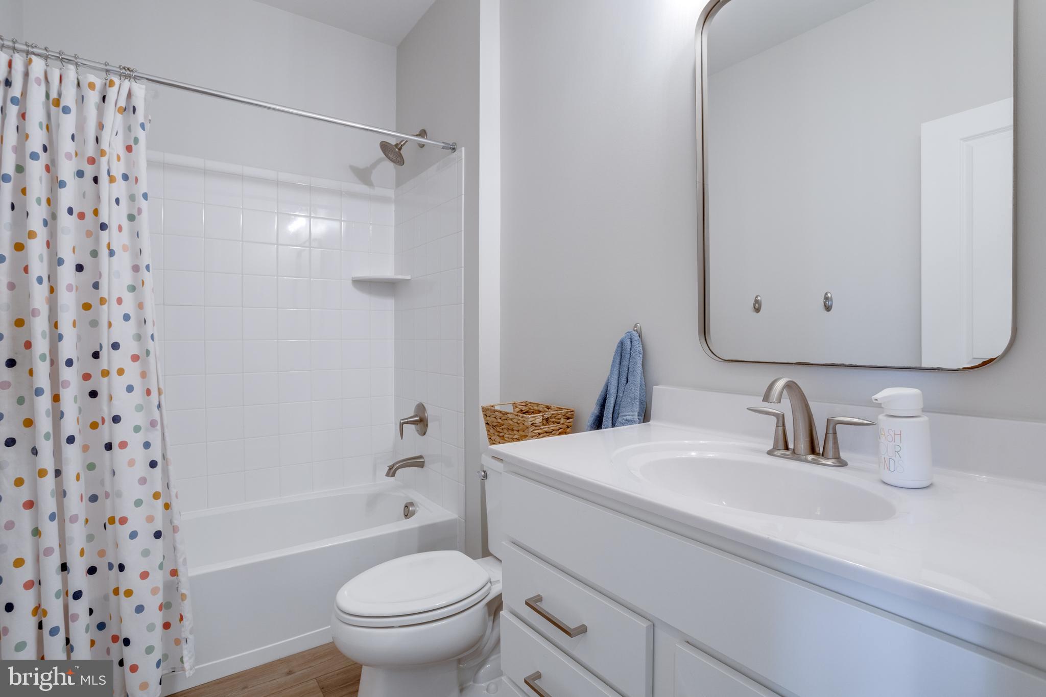 14488 Nebbiolo Drive Gainesville, VA 20155 - Photo 38 of 54 a bathroom with a sink toilet and shower