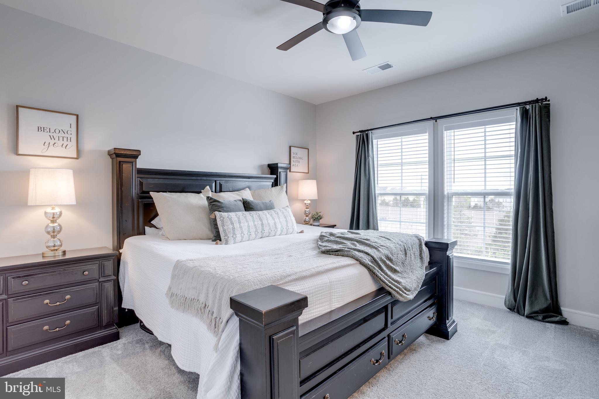 14488 Nebbiolo Drive Gainesville, VA 20155 - Photo 5 of 54 a bedroom with a bed and a window