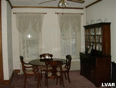 432 Ridge Avenue Allentown, PA 18102 - Photo 6 of 17 FRONT OF LIVING ROOM CURRENTLY USED AS DINING AREA