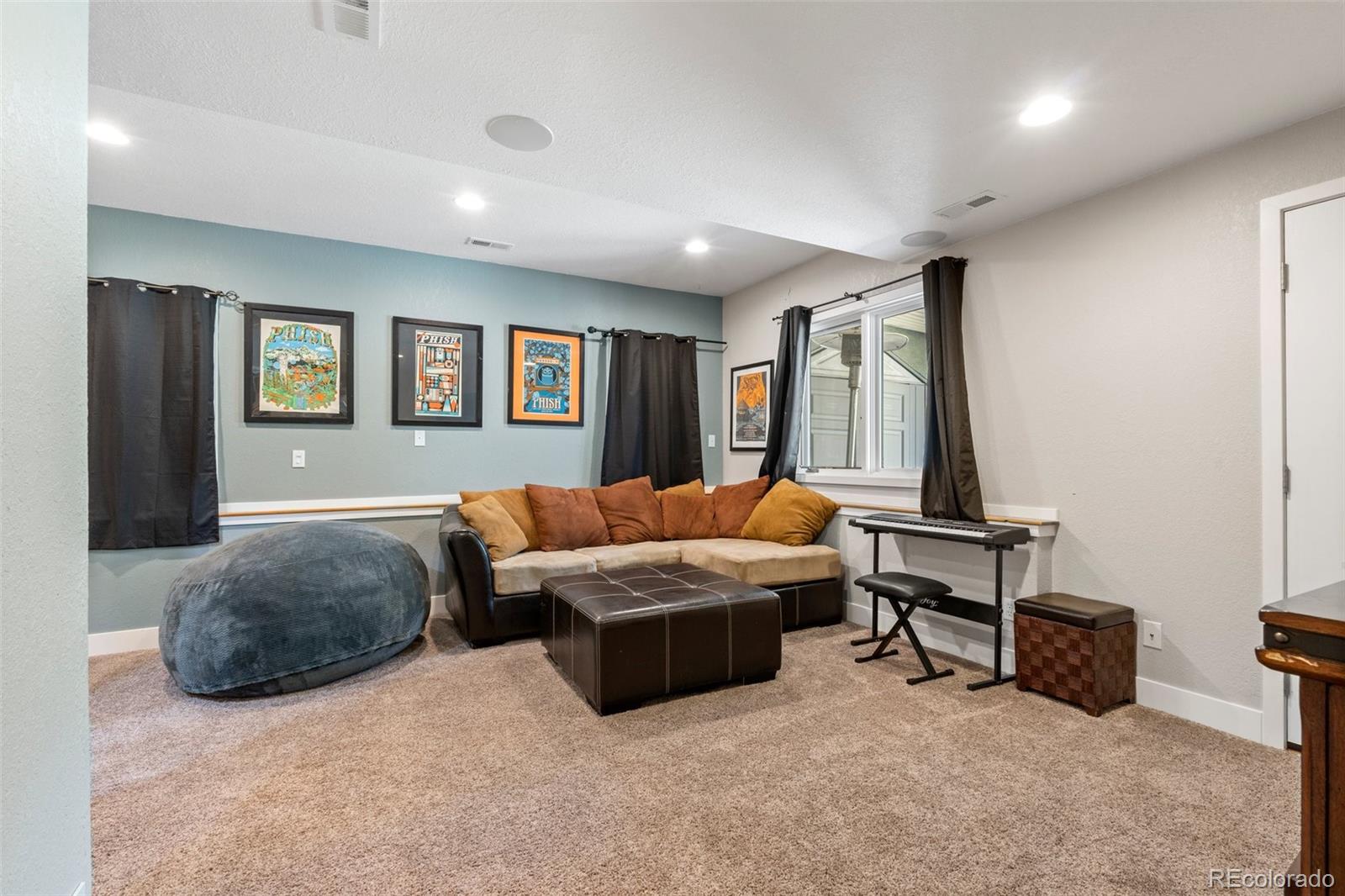 1682 Sinton Road Evergreen, CO 80439 - Photo 27 of 40 a living room with furniture