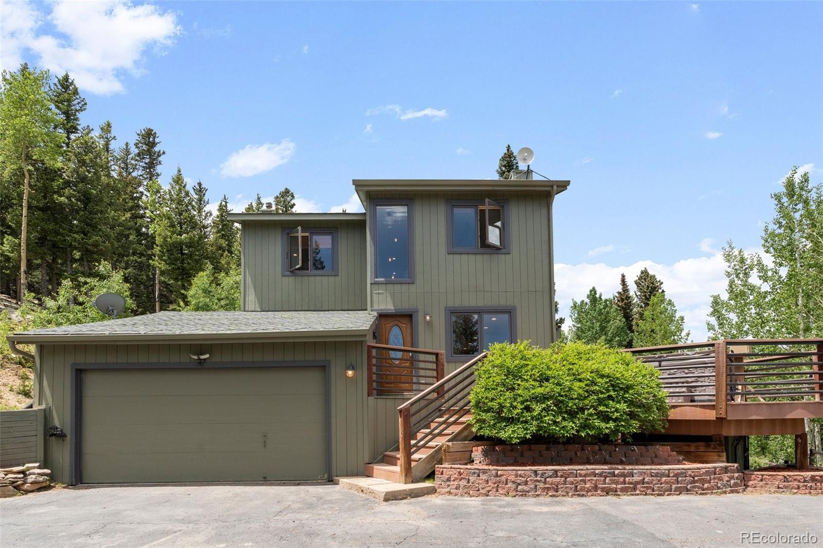 1682 Sinton Road Evergreen, CO 80439 - Photo 36 of 40 a house view with a outdoor space