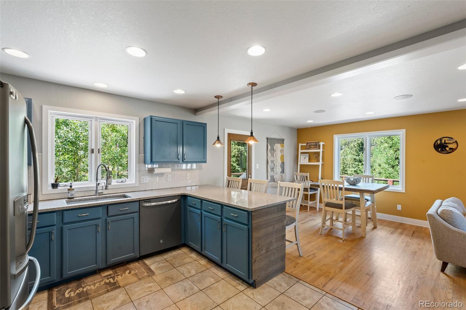 1682 Sinton Road Evergreen, CO 80439 - Photo 8 of 40 a kitchen with a sink and counter space