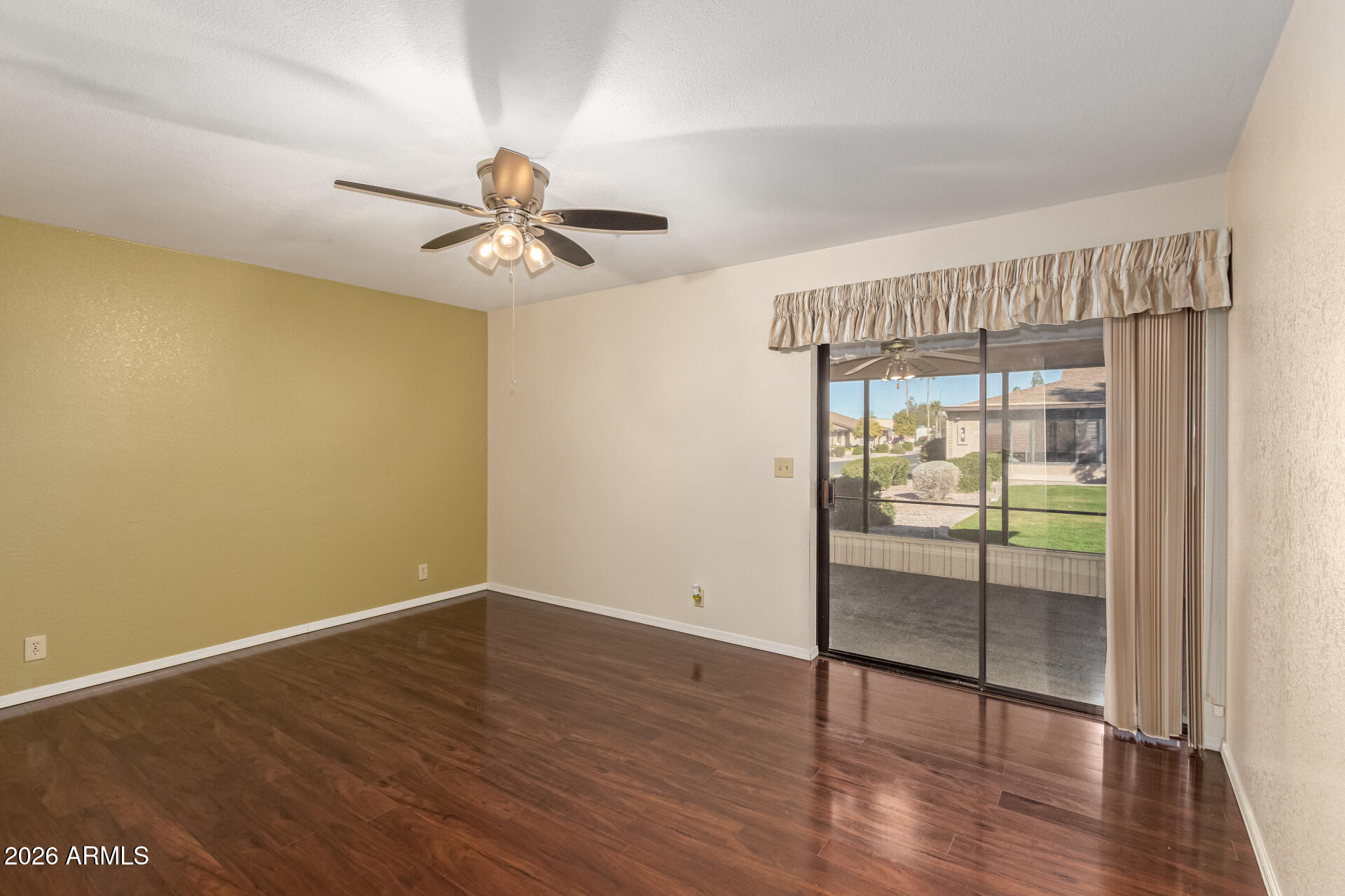 520 South Greenfield Road, Unit 30 Mesa, AZ 85206 - Photo 11 of 29 wooden floor in an empty room with a window