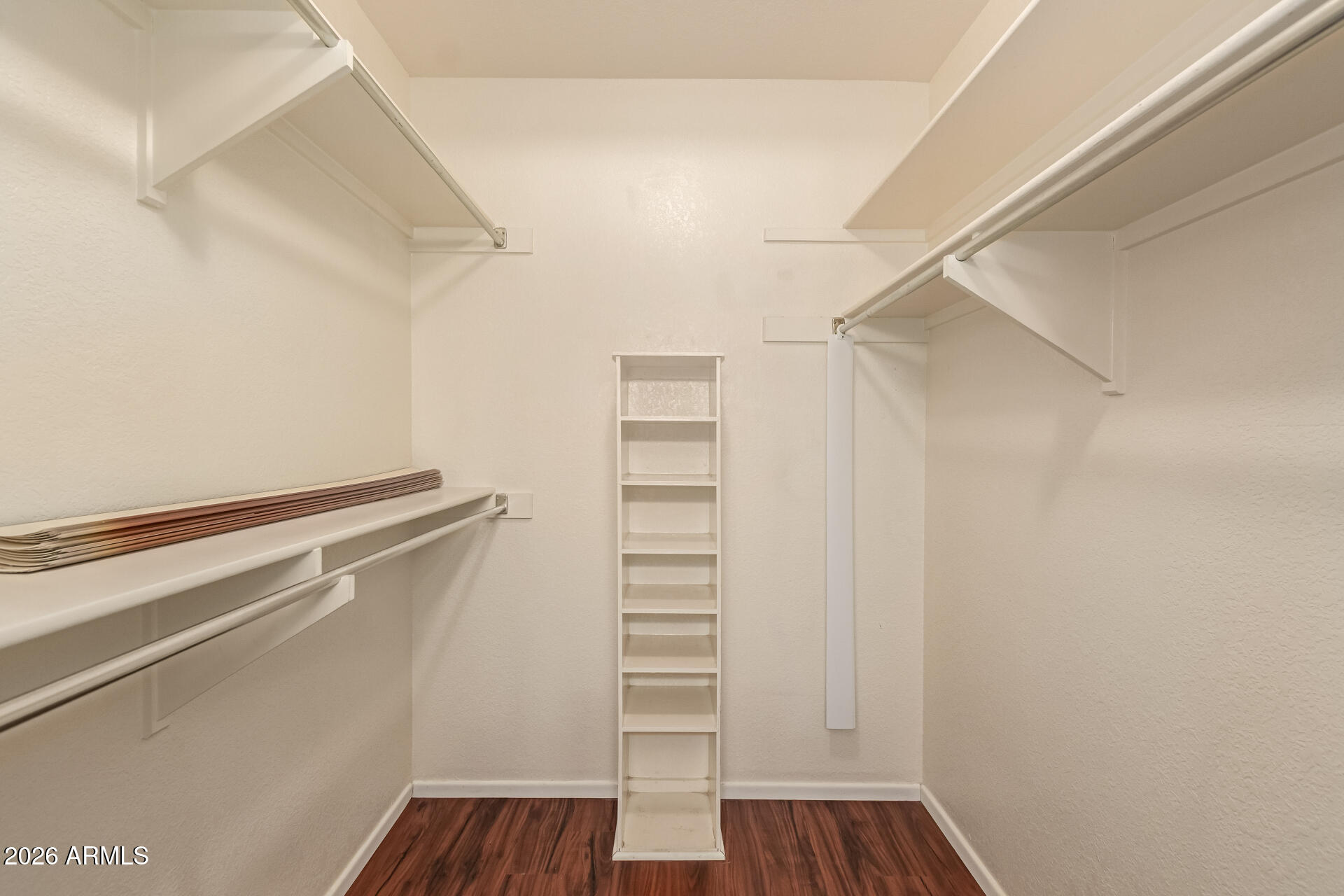 520 South Greenfield Road, Unit 30 Mesa, AZ 85206 - Photo 17 of 29 a view of walk in closet with empty racks