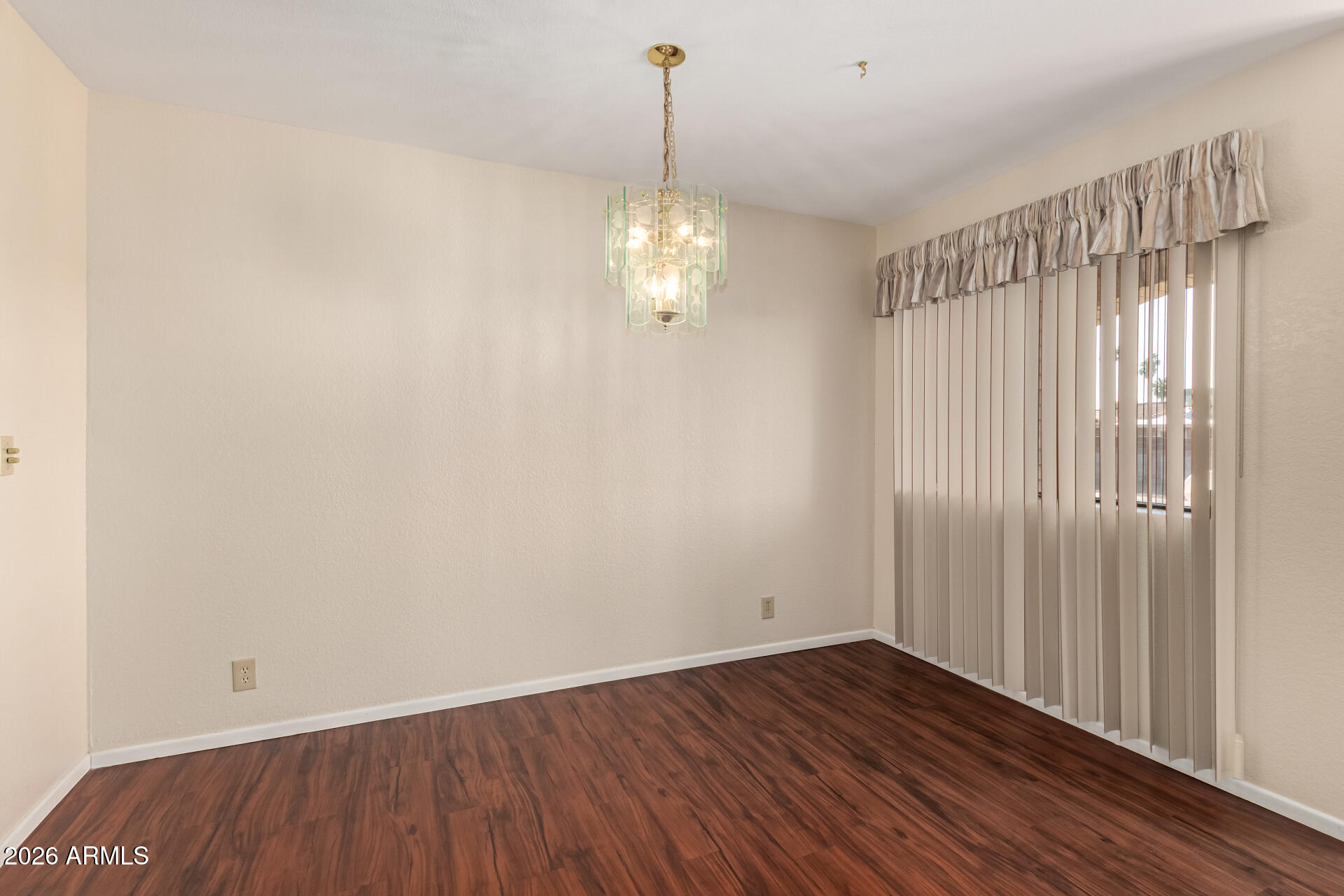 520 South Greenfield Road, Unit 30 Mesa, AZ 85206 - Photo 8 of 29 a view of a room with wooden floor fan and window