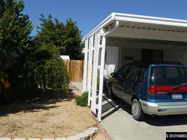 2695 Daffodil Way Reno, NV 89512 - Photo 1 of 5 a view of car parked in garage