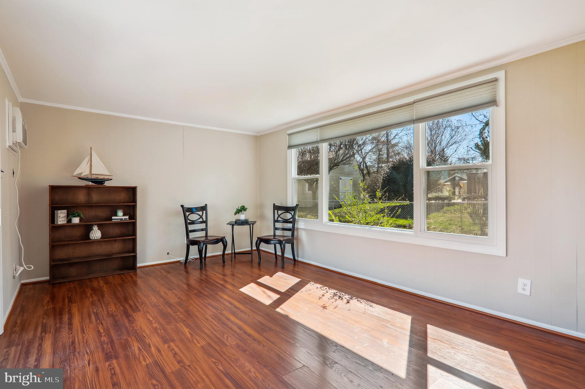 12403 Shawmont Lane Bowie, MD 20715 - Photo 14 of 59 a living room with furniture and a large window