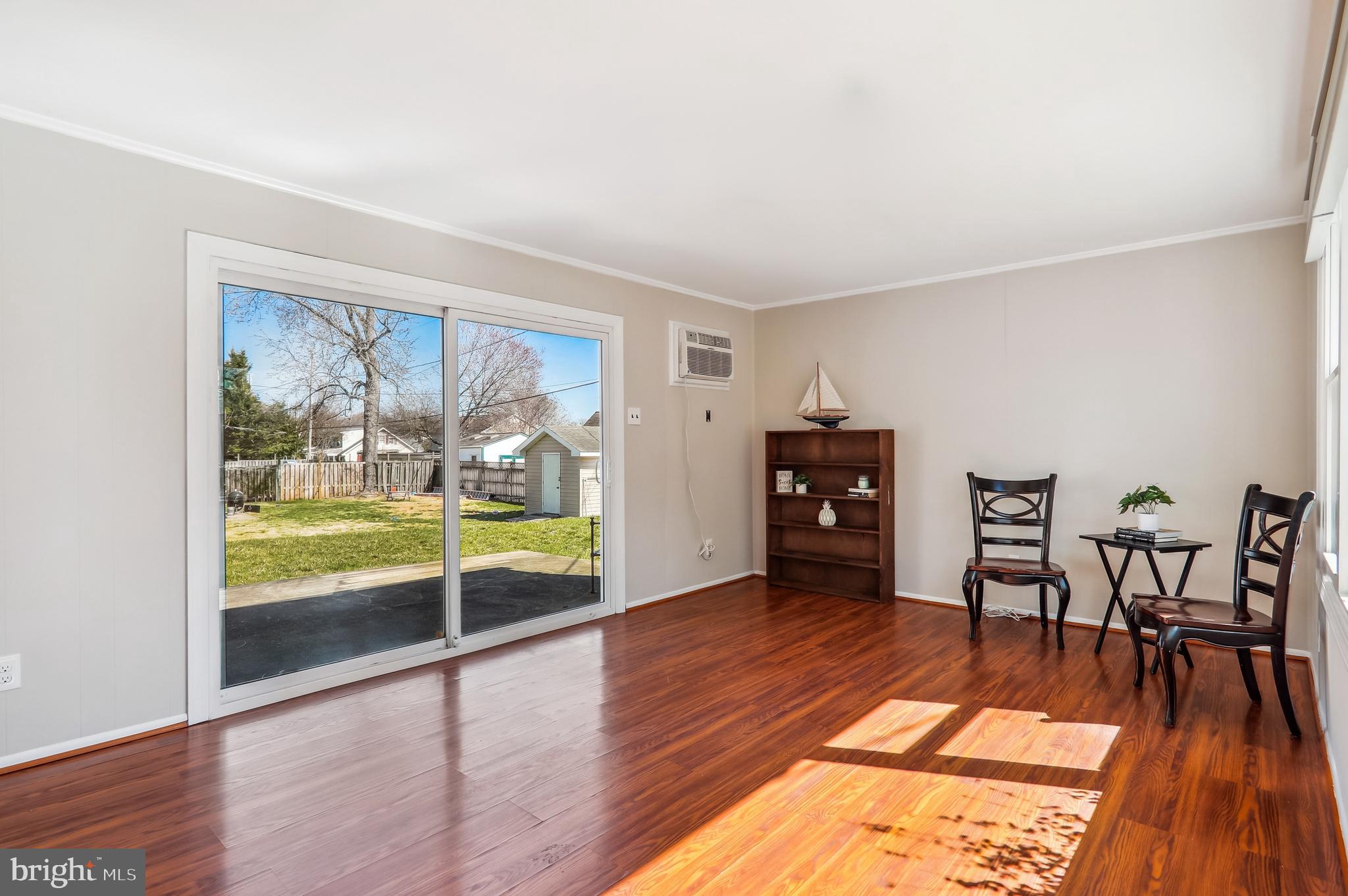 12403 Shawmont Lane Bowie, MD 20715 - Photo 16 of 59 a living room with furniture and a large window