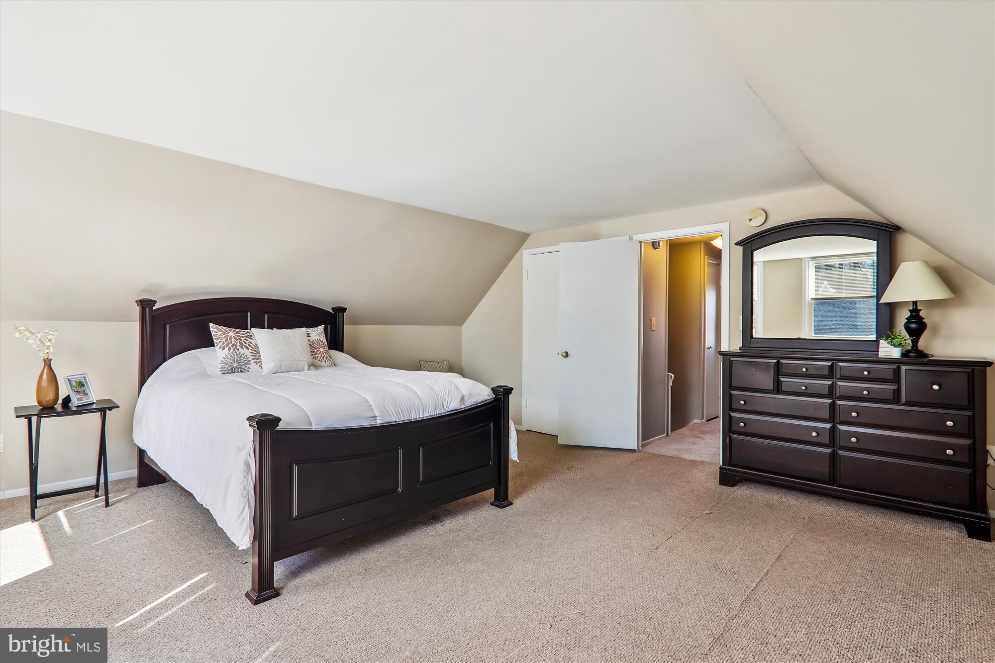 12403 Shawmont Lane Bowie, MD 20715 - Photo 31 of 59 a bedroom with a bed and a large window