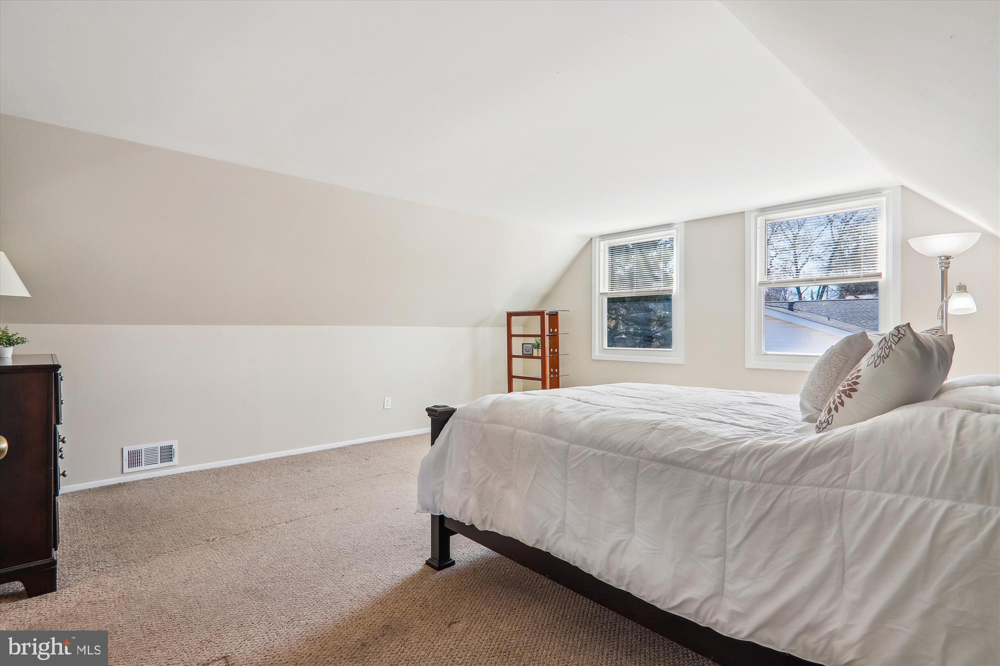 12403 Shawmont Lane Bowie, MD 20715 - Photo 32 of 59 a bedroom with a bed and a window