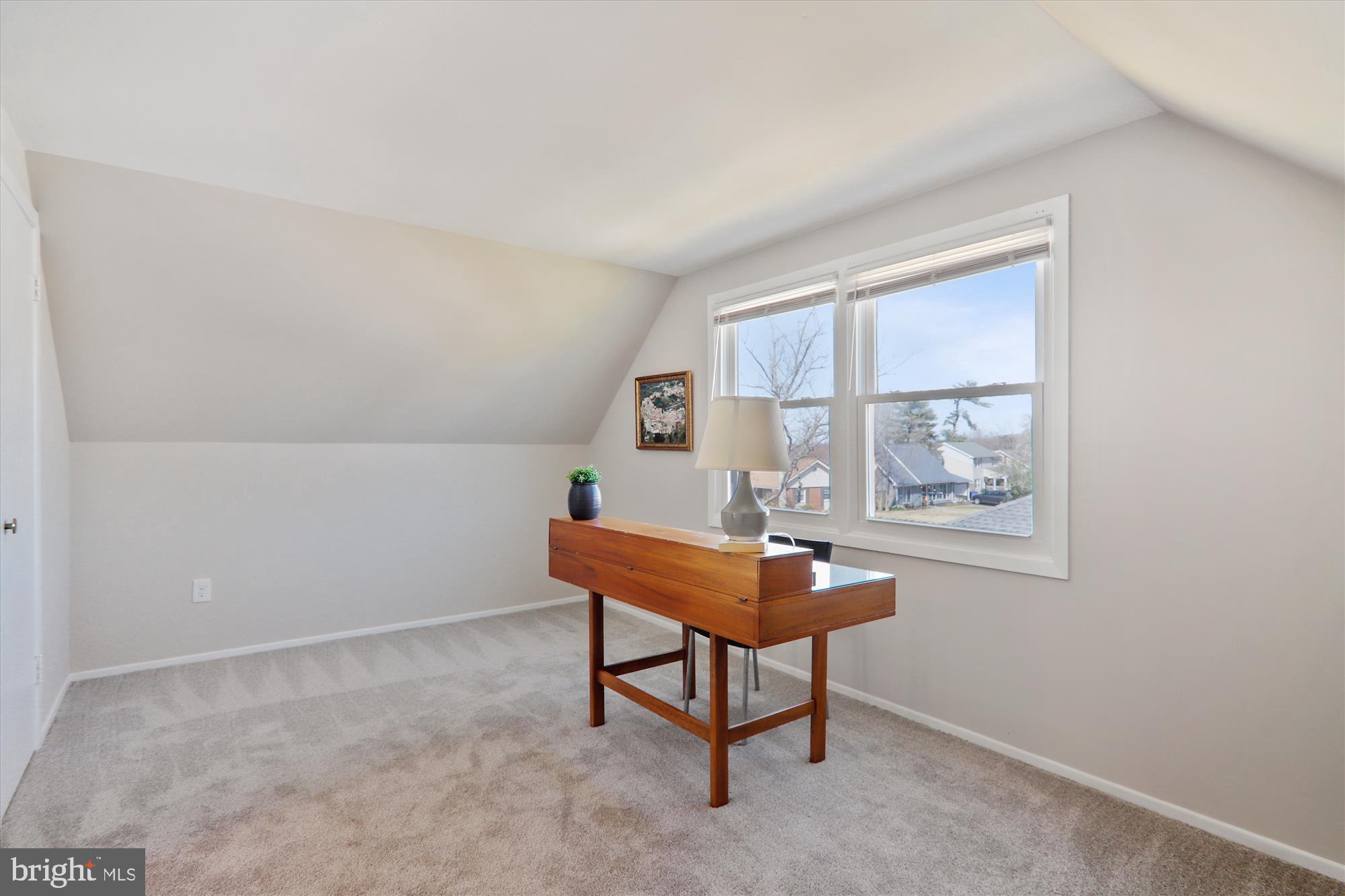 12403 Shawmont Lane Bowie, MD 20715 - Photo 36 of 59 a room with furniture and a window