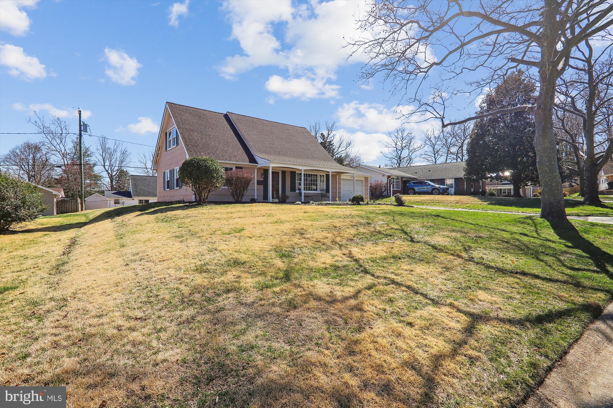 12403 Shawmont Lane Bowie, MD 20715 - Photo 41 of 59 a view of a house with a yard