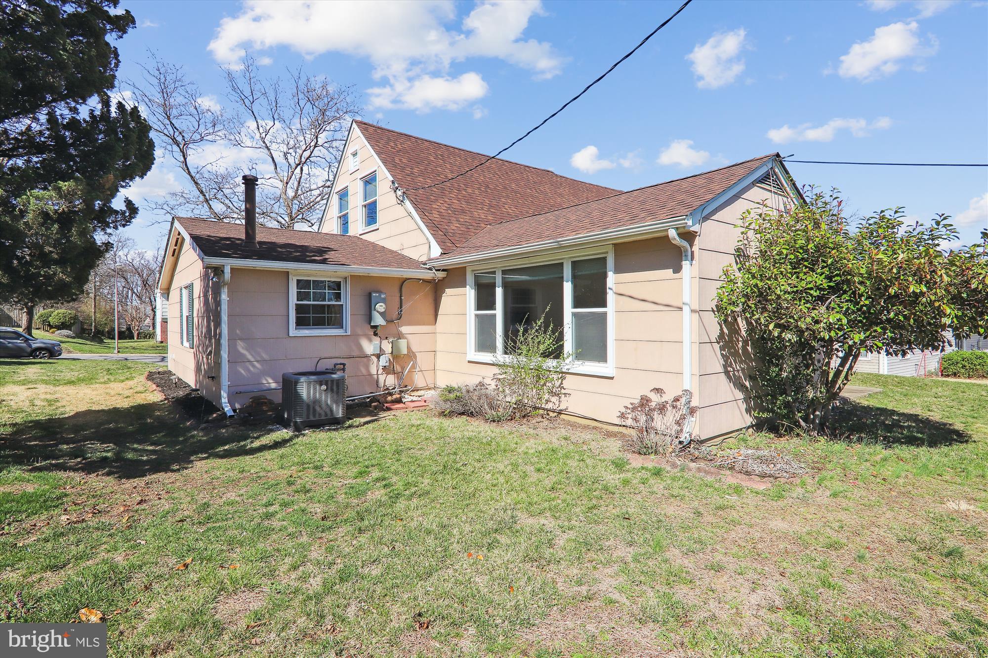 12403 Shawmont Lane Bowie, MD 20715 - Photo 44 of 59 a view of a house with a yard