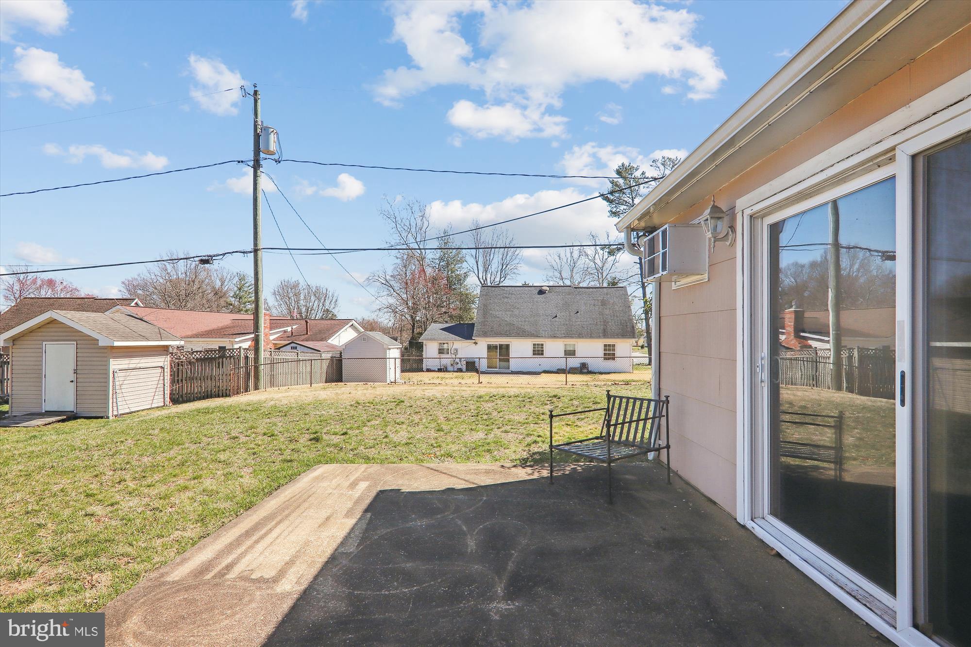 12403 Shawmont Lane Bowie, MD 20715 - Photo 49 of 59 a view of a house with a swimming pool