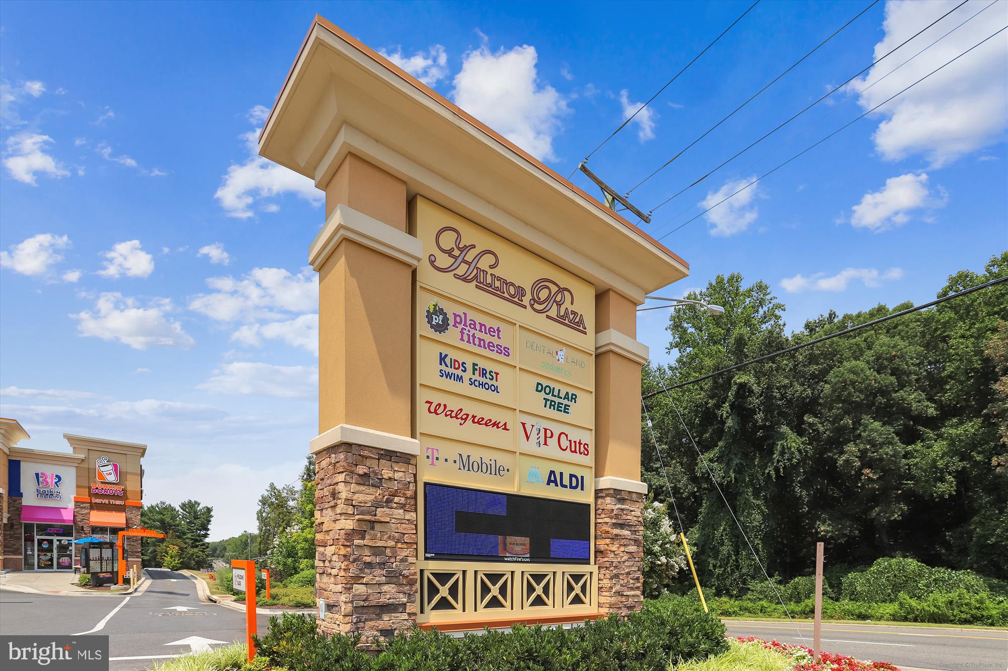 12403 Shawmont Lane Bowie, MD 20715 - Photo 50 of 59 a sign on the side of a building