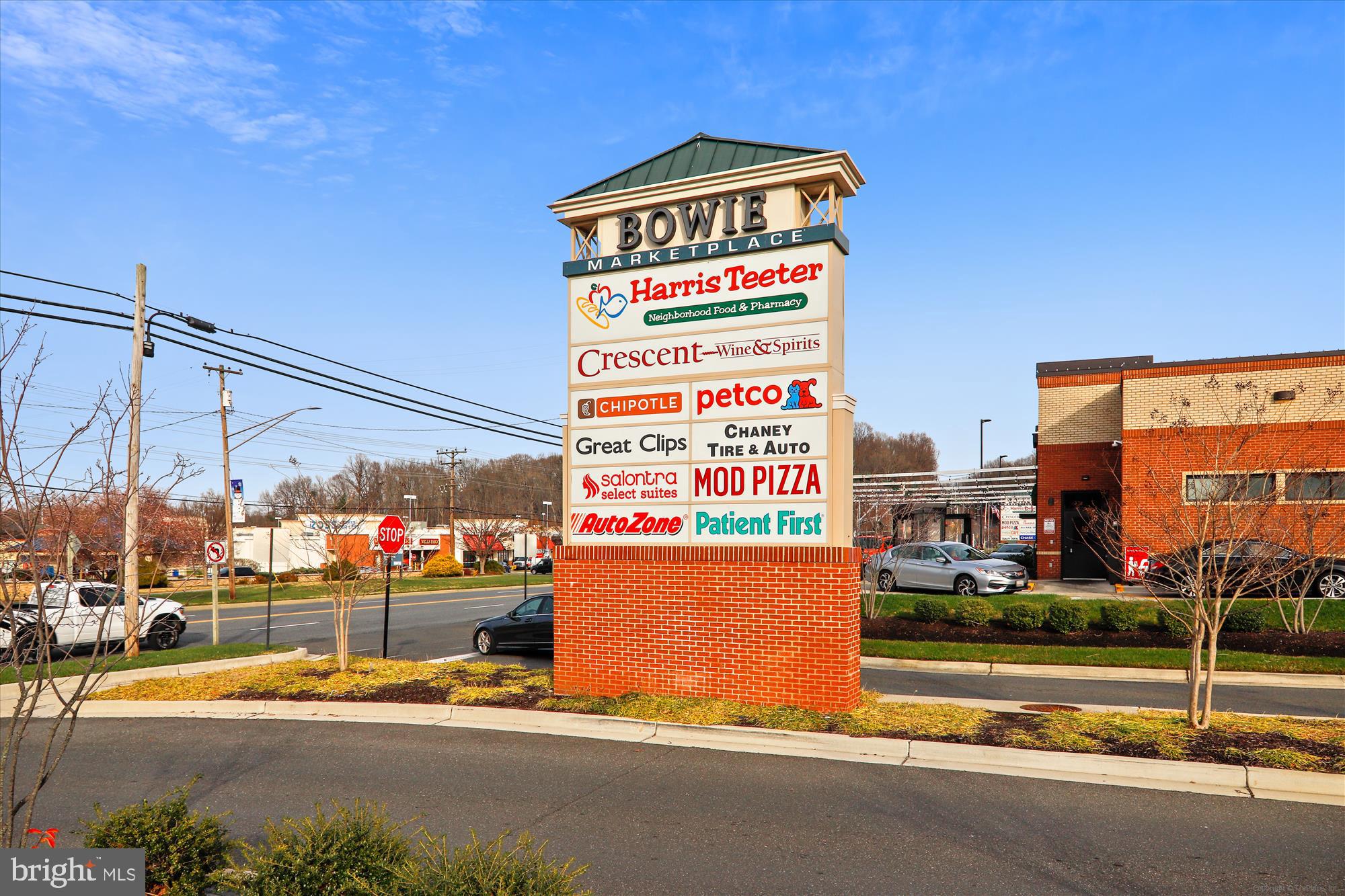 12403 Shawmont Lane Bowie, MD 20715 - Photo 57 of 59 a street sign on a wall next to a road