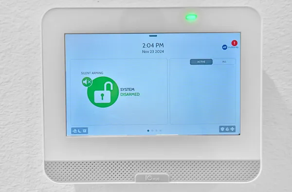 a view of a house with a big yard and large trees