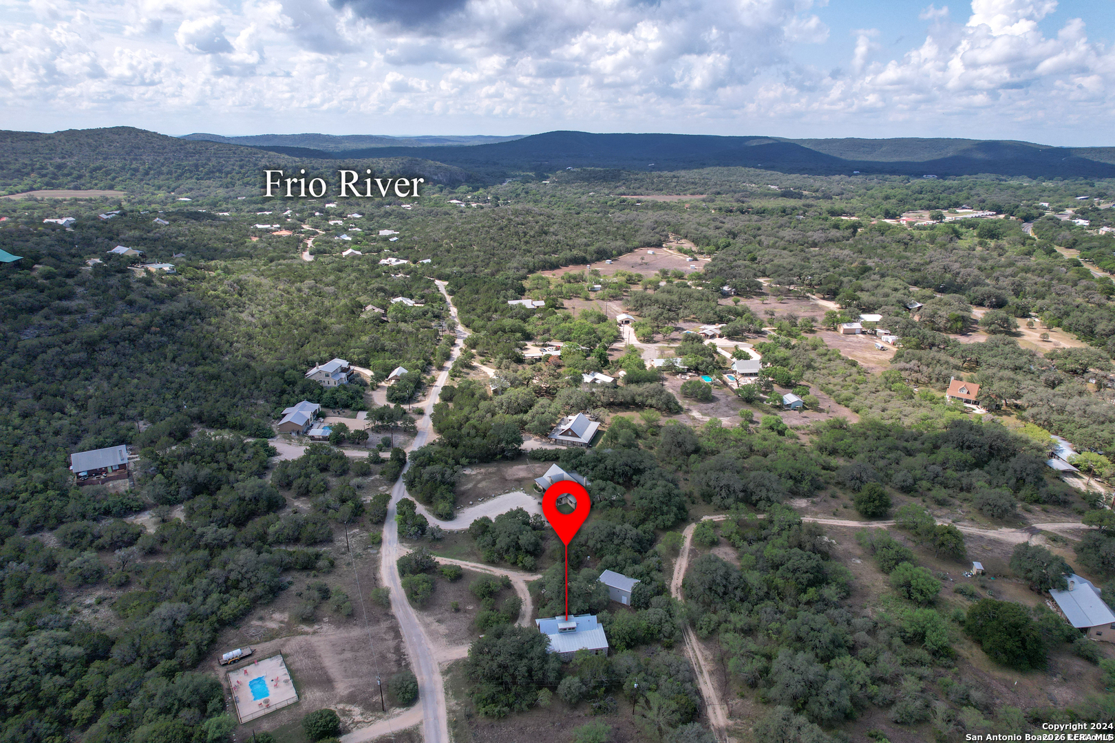 711 Mariposa Concan, TX 78838 - Photo 16 of 23 a view of a city