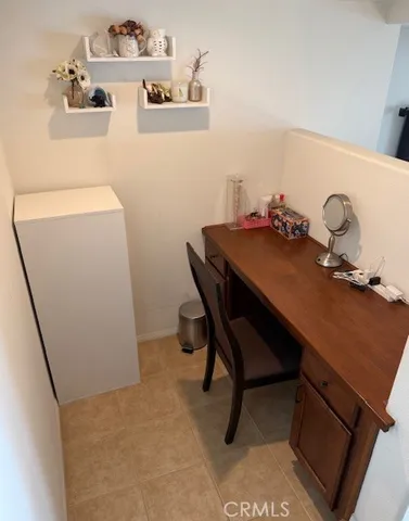 a room with a table and chairs