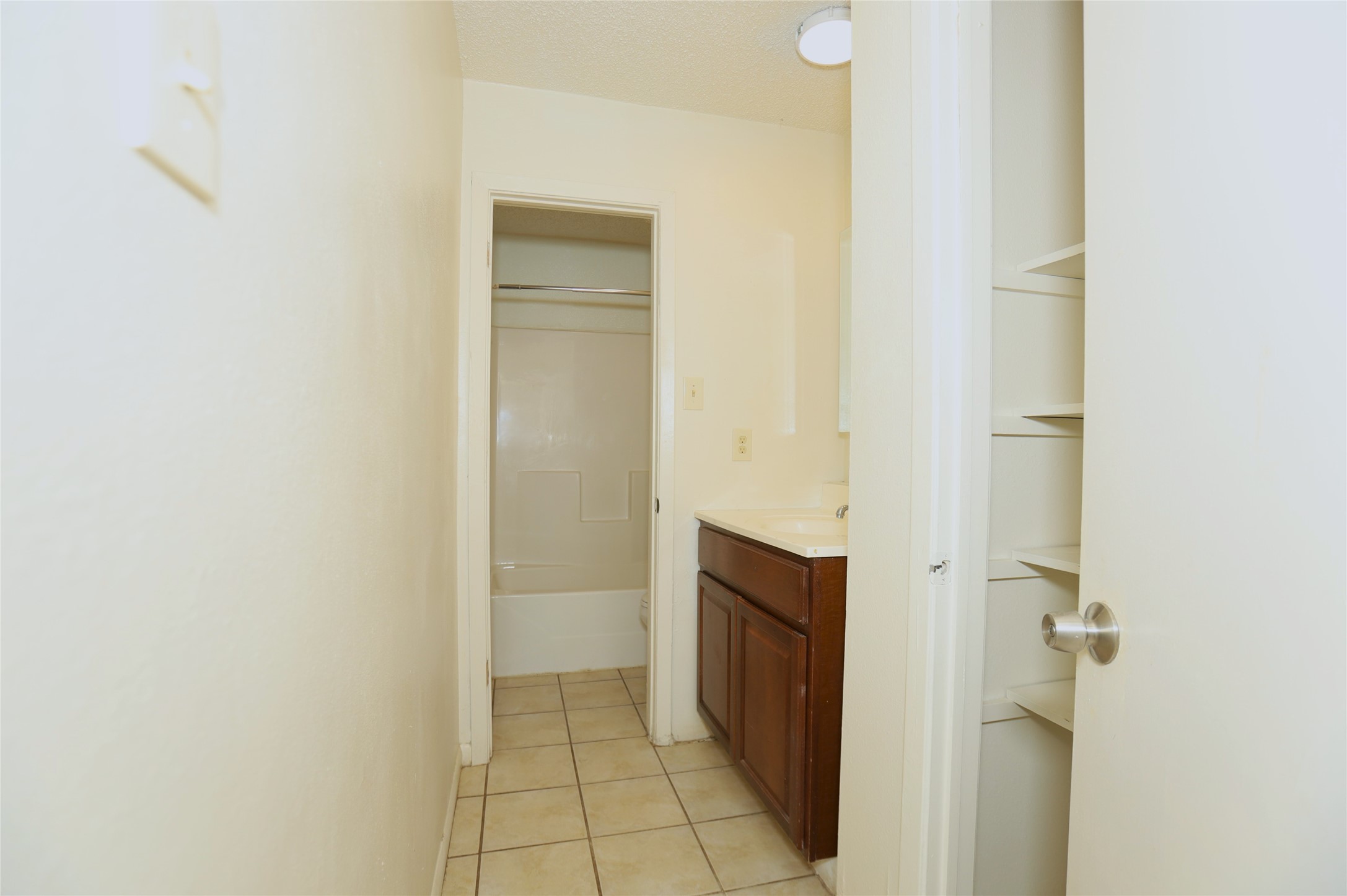 1131 Gifford Road Angleton, TX 77515 - Photo 7 of 14 a view of bathroom with a shower and a sink