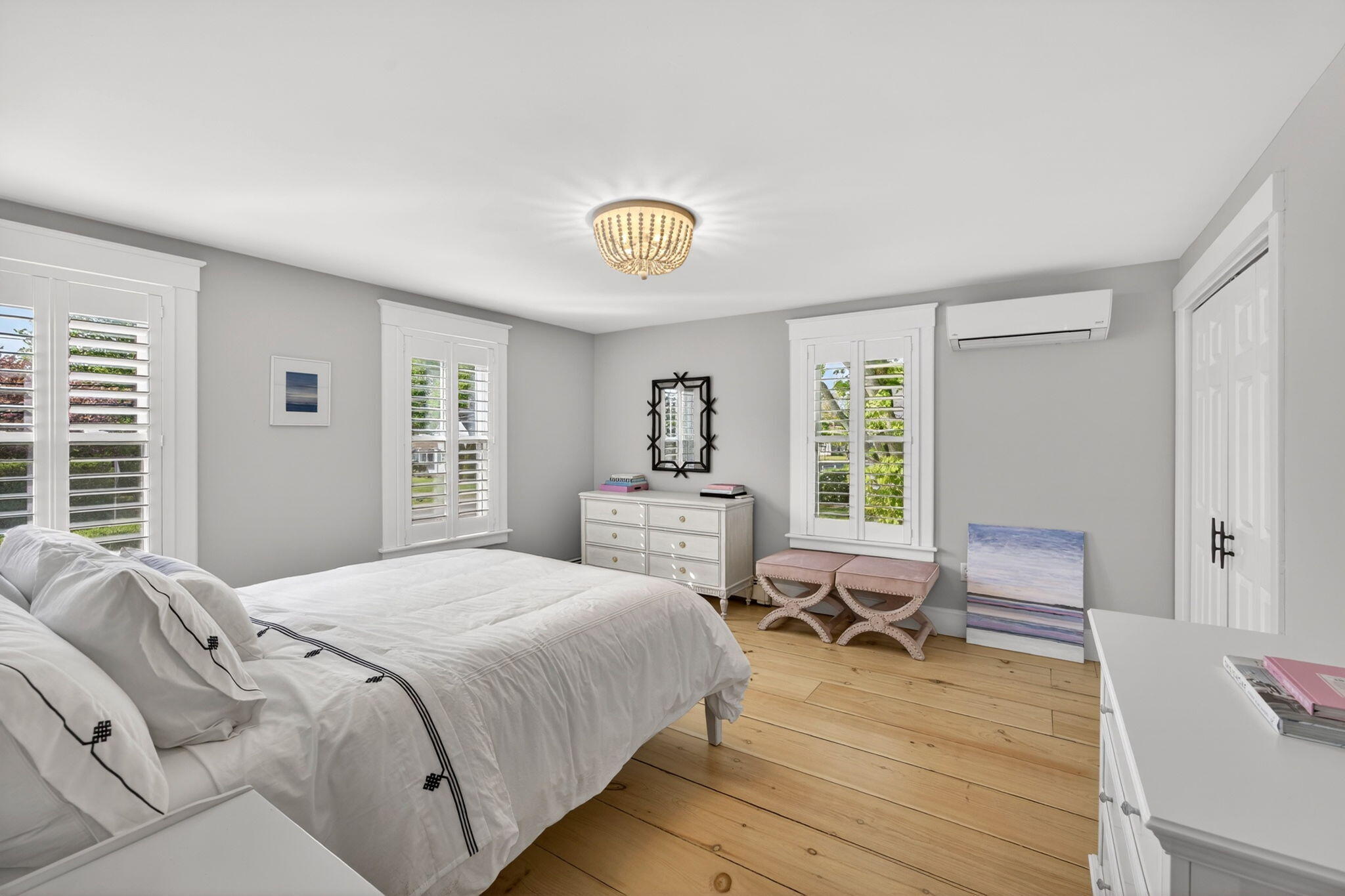 320 Old Harbor Road Chatham, MA 02633 - Photo 44 of 58 a bedroom with a bed and wooden floor