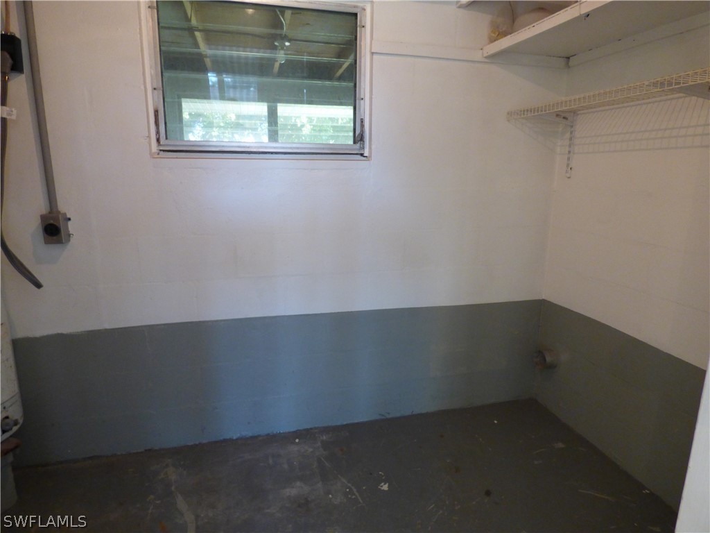 307 East Penn Road Lehigh Acres, FL 33936 - Photo 16 of 20 an empty room with a window