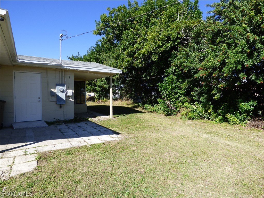 307 East Penn Road Lehigh Acres, FL 33936 - Photo 3 of 20 a view of a backyard
