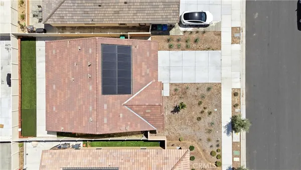 an aerial view of residential houses and outdoor space