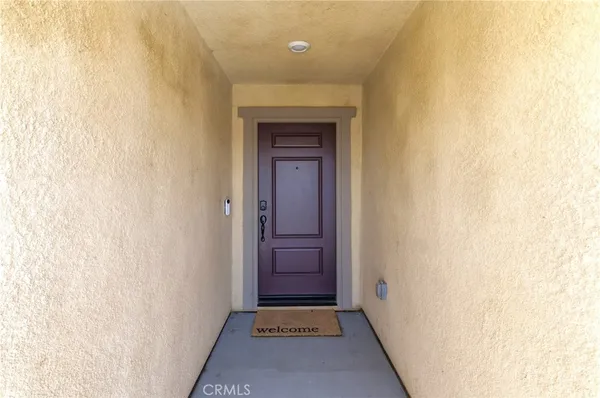 a view of hallway with door