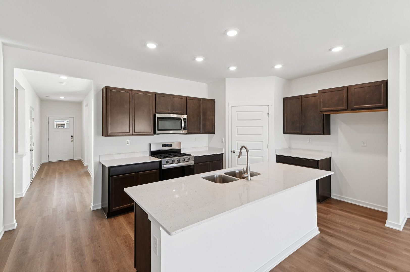 829 Mesa Lane Pingree Grove, IL 60140 - Photo 14 of 55 a kitchen with stainless steel appliances a microwave sink and refrigerator