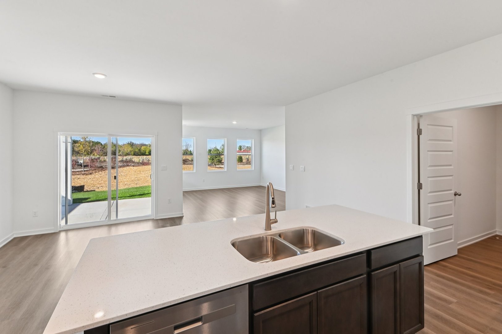 829 Mesa Lane Pingree Grove, IL 60140 - Photo 18 of 55 a kitchen with a sink and a refrigerator