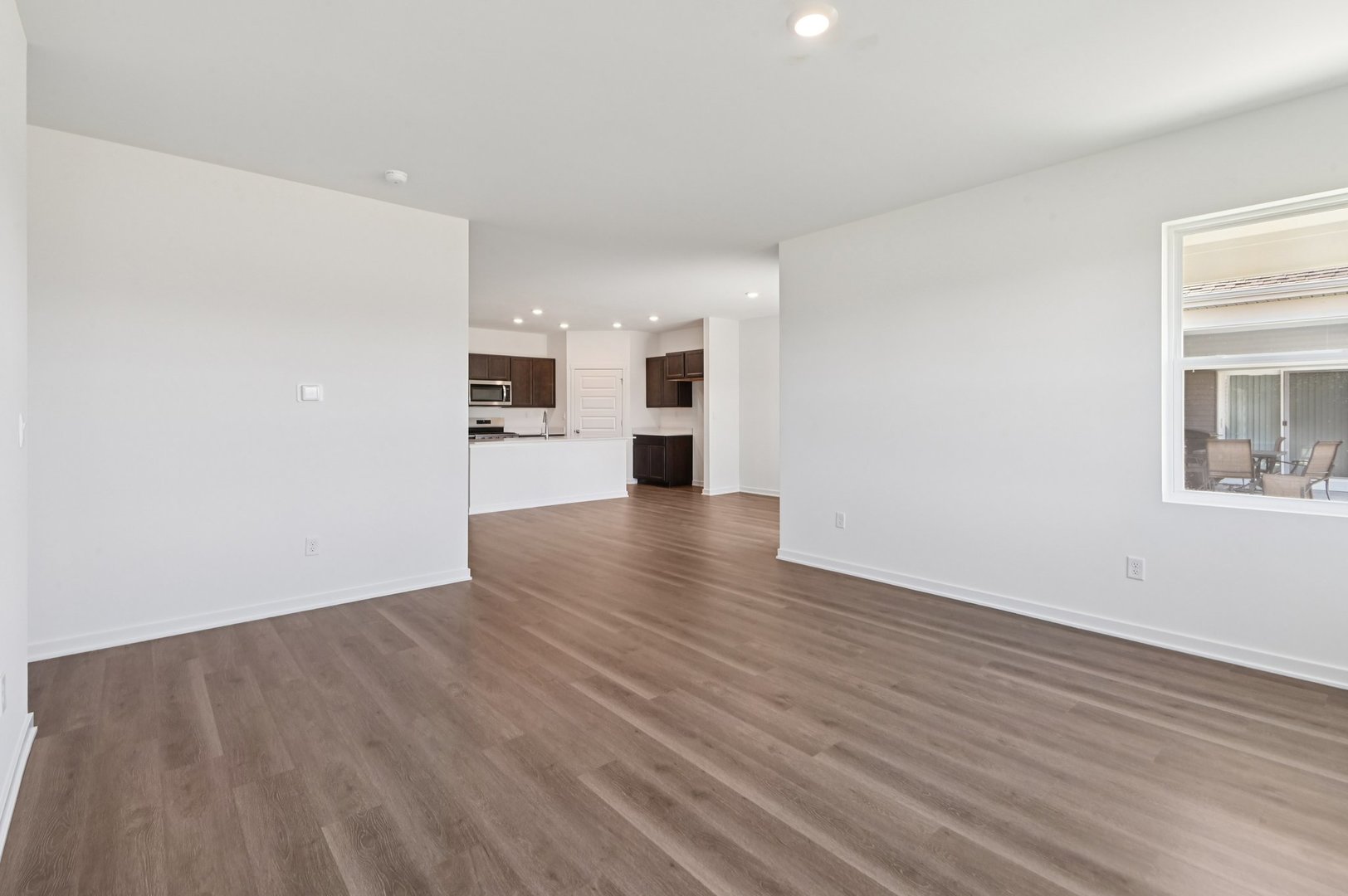 829 Mesa Lane Pingree Grove, IL 60140 - Photo 23 of 55 wooden floor in an empty room with a window