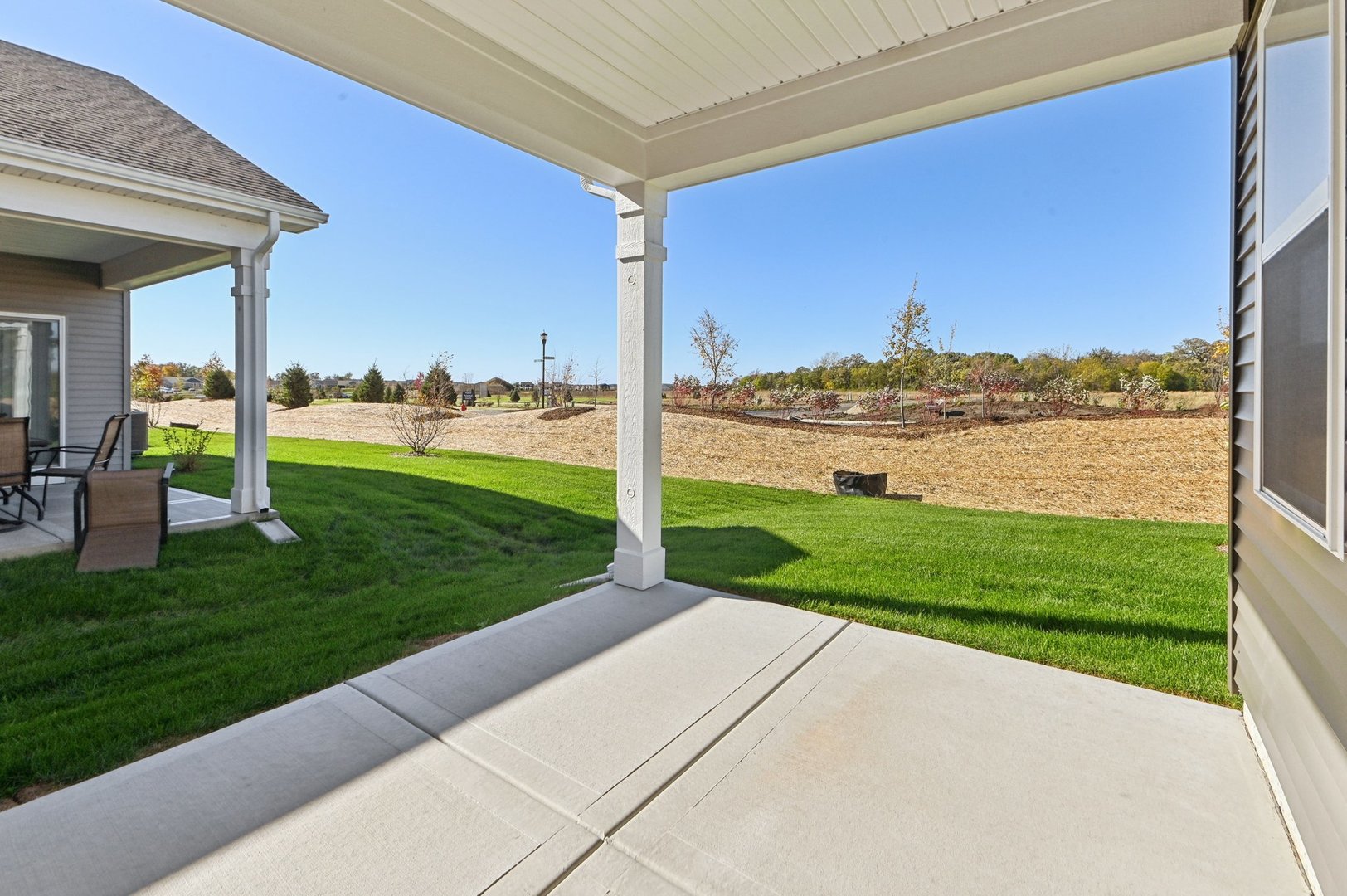 829 Mesa Lane Pingree Grove, IL 60140 - Photo 33 of 55 a view of a patio with a yard