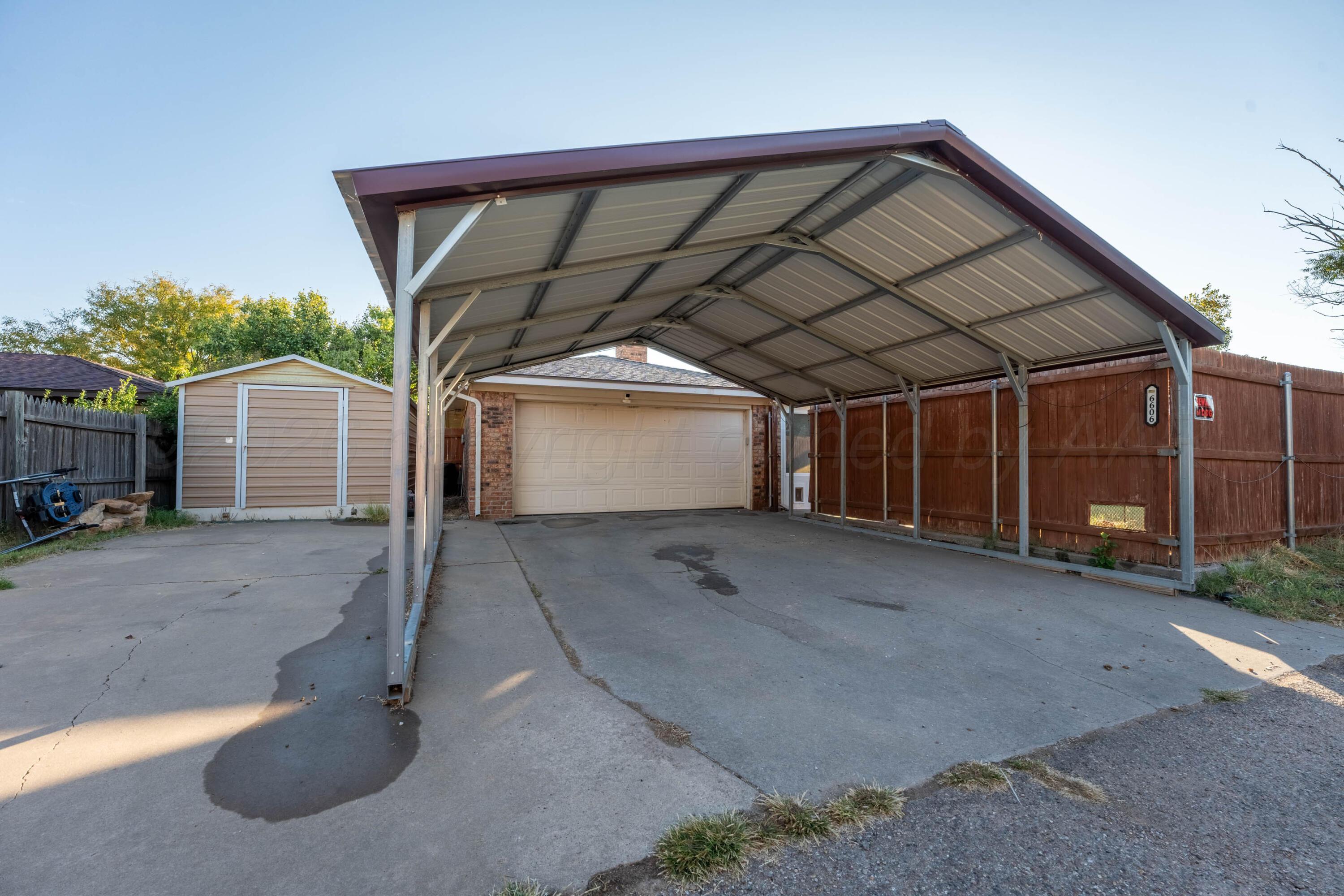 6606 Drexel Road Amarillo, TX 79109 - Photo 41 of 44 a view of a house with a parking space