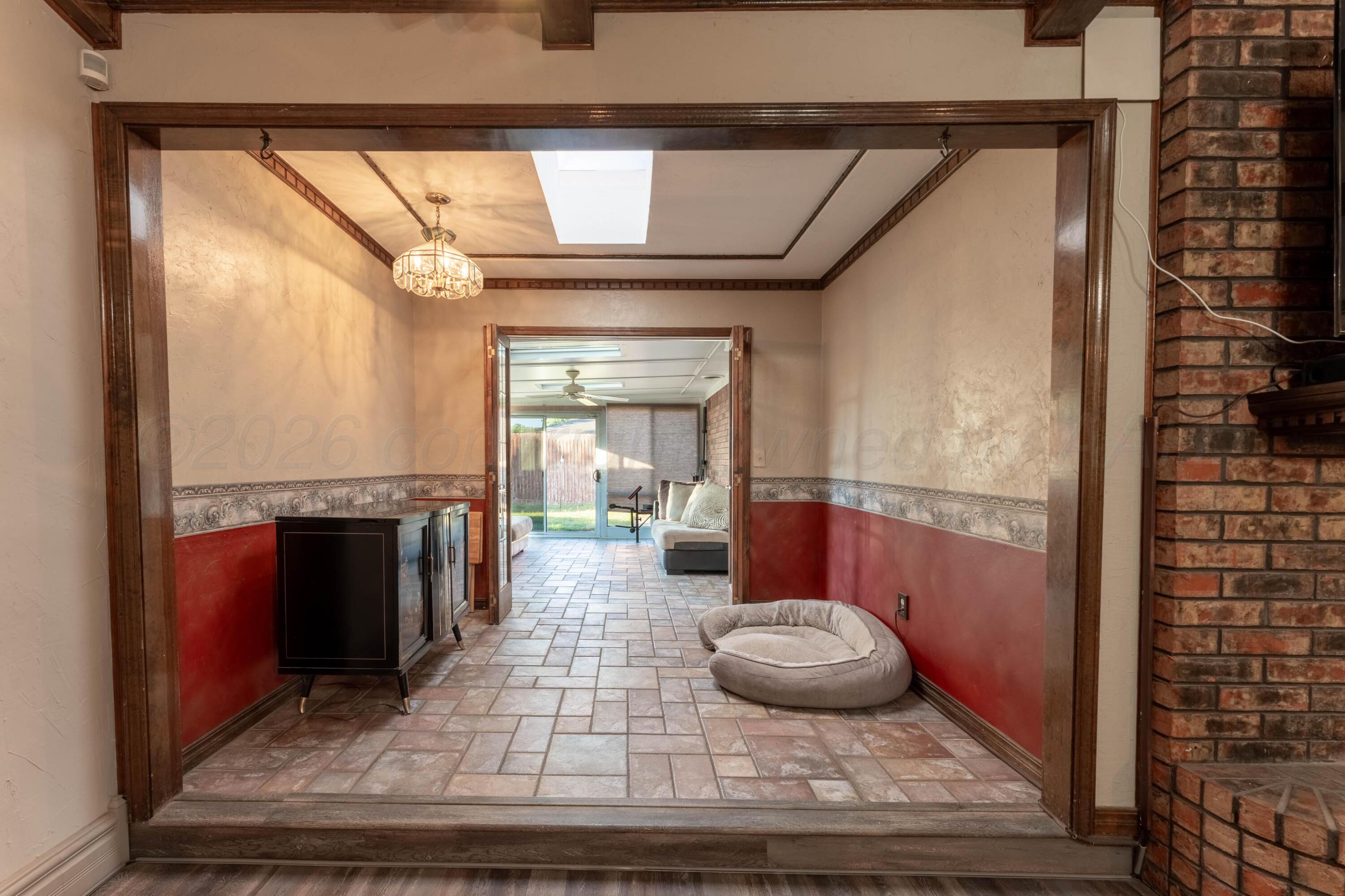 6606 Drexel Road Amarillo, TX 79109 - Photo 10 of 44 a view of a living room and entry way