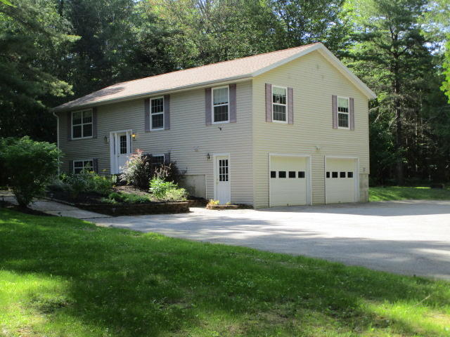 55 Fields Pond Road Holden, ME 04429 - Photo 2 of 26 Exterior Side w/ garage