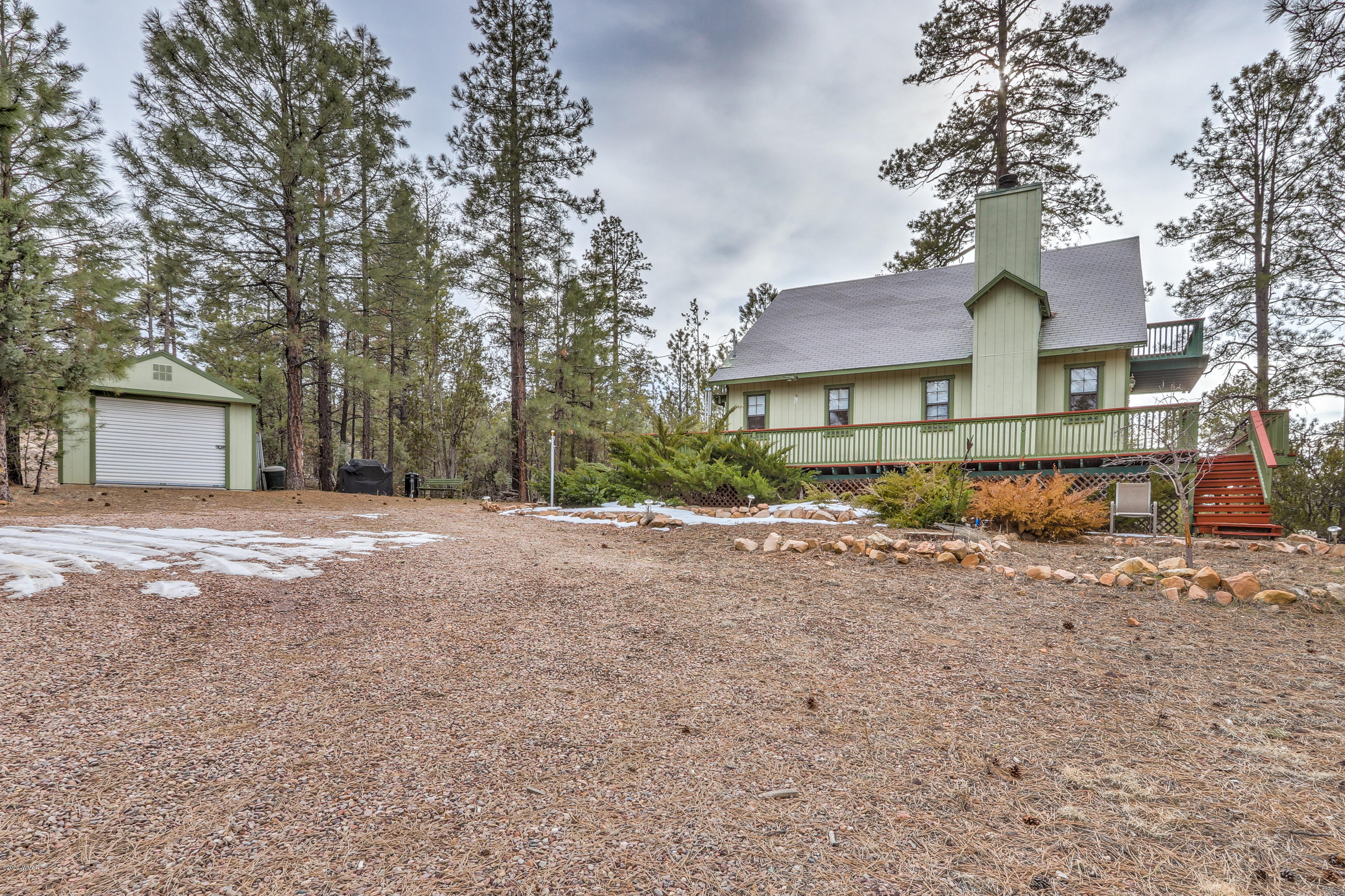 1939 Artist Draw Road Heber, AZ 85928 - Photo 1 of 40 a front view of a house with a yard and garage